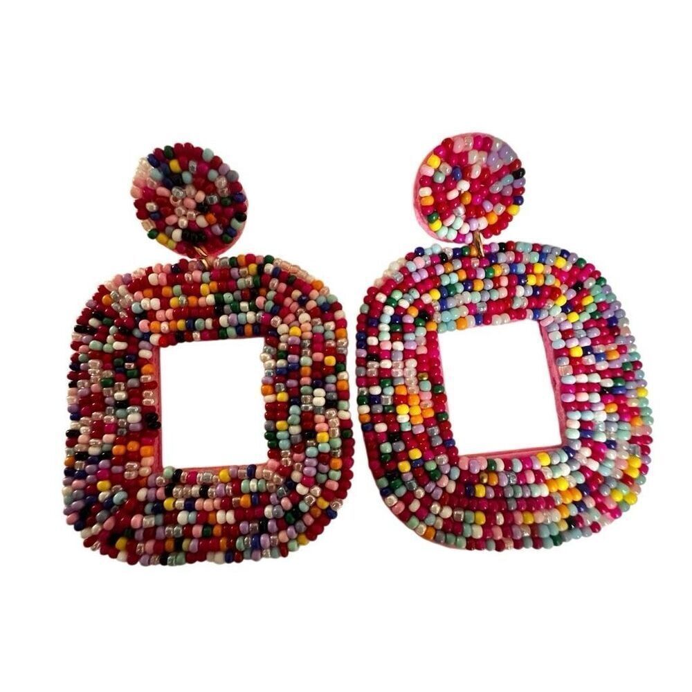 Pink beaded statement earrings